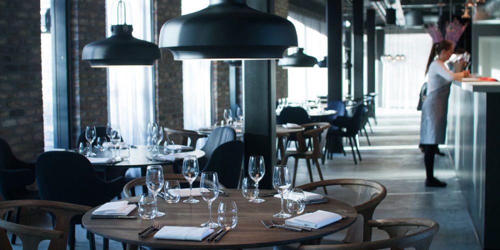 Blurred restaurant interior with warm lighting